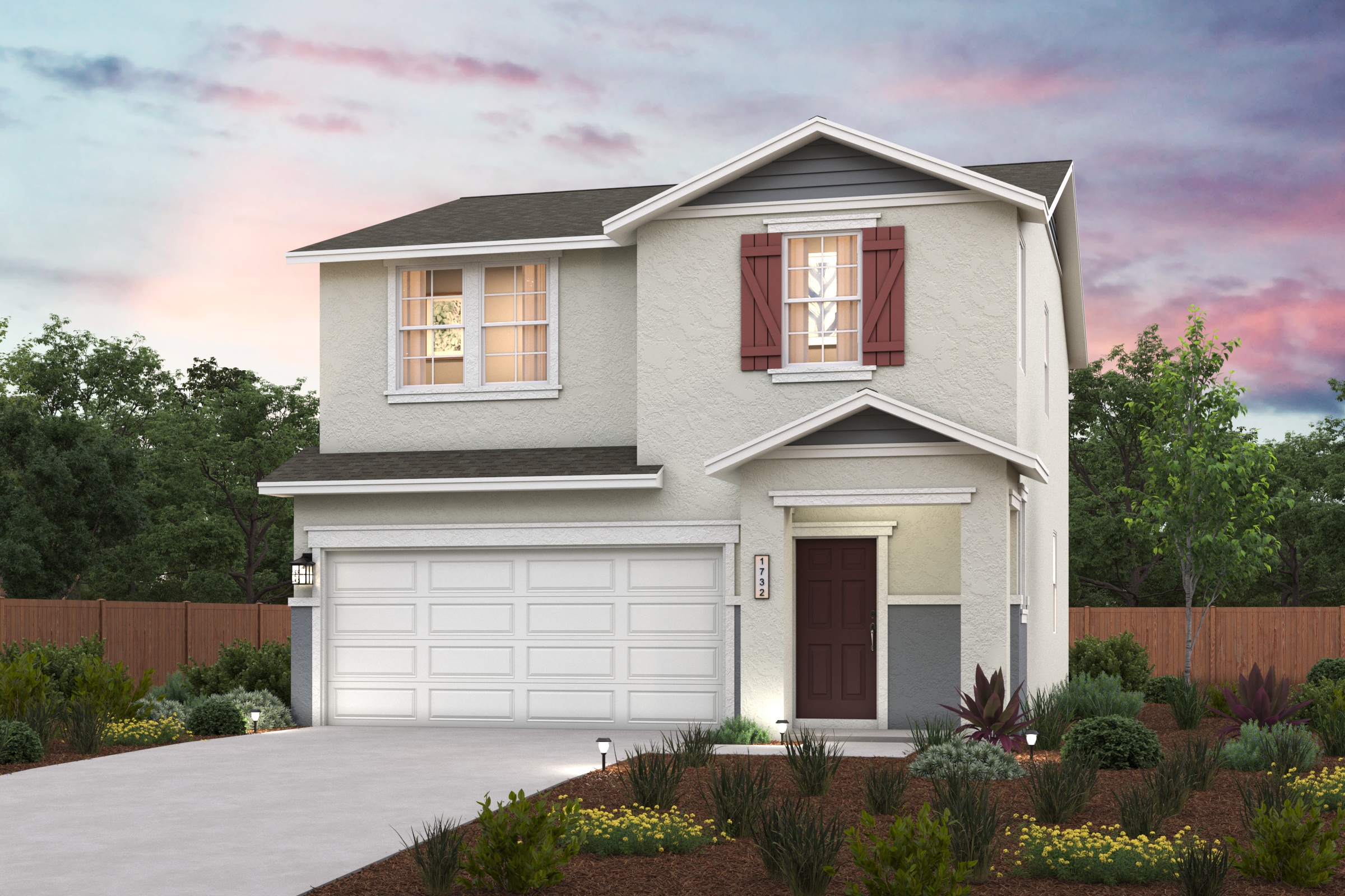 A house with a garage and a fence.