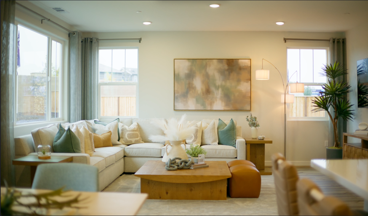 A living room with a large window.