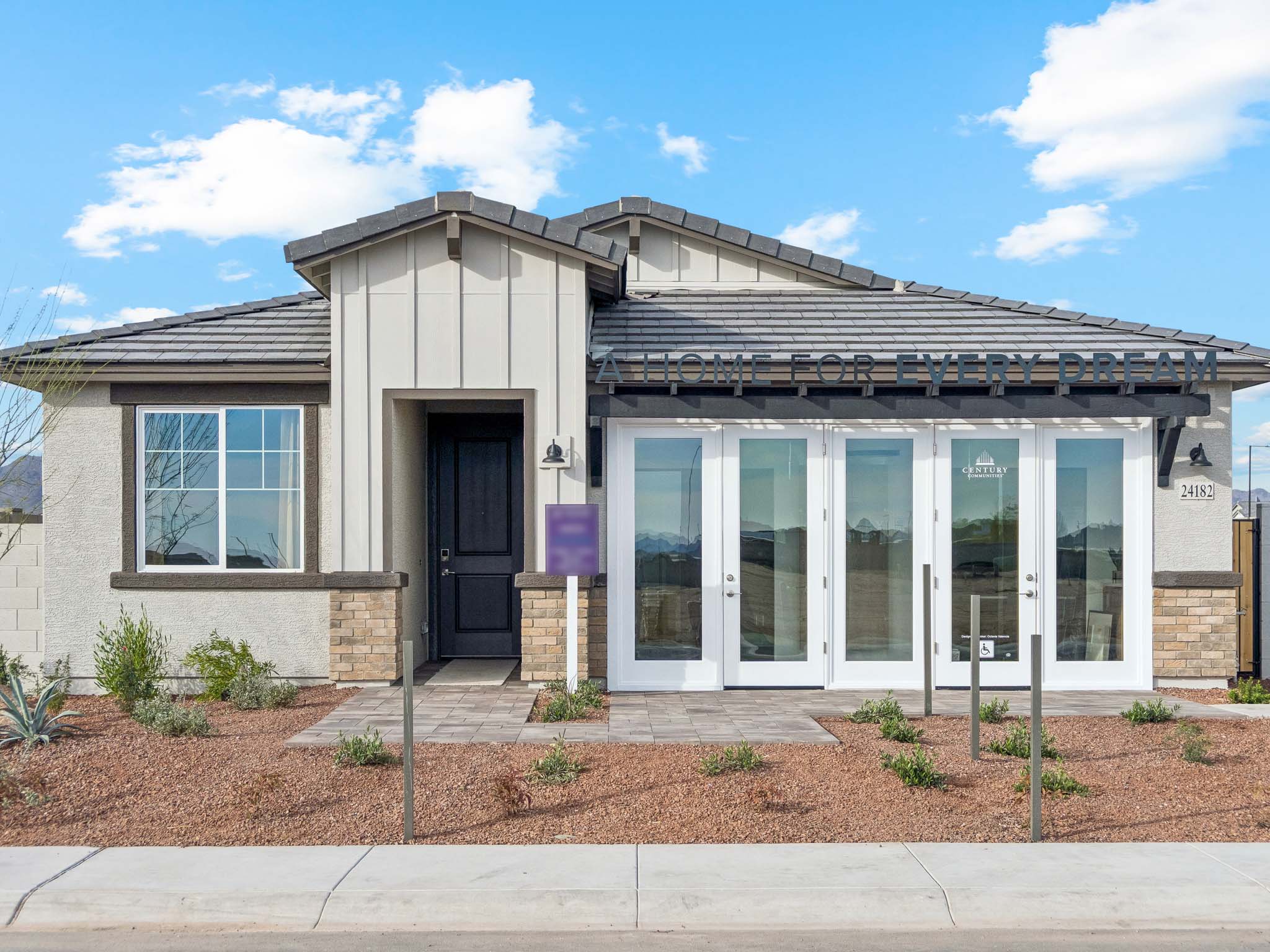 A house with a glass front door.