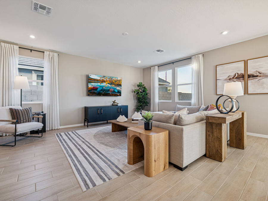 A living room with a couch and a coffee table.