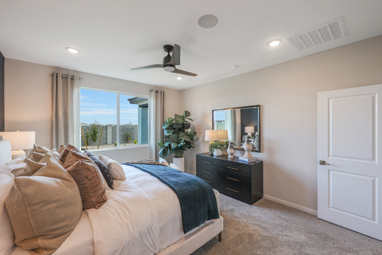 A large living room with a large window.