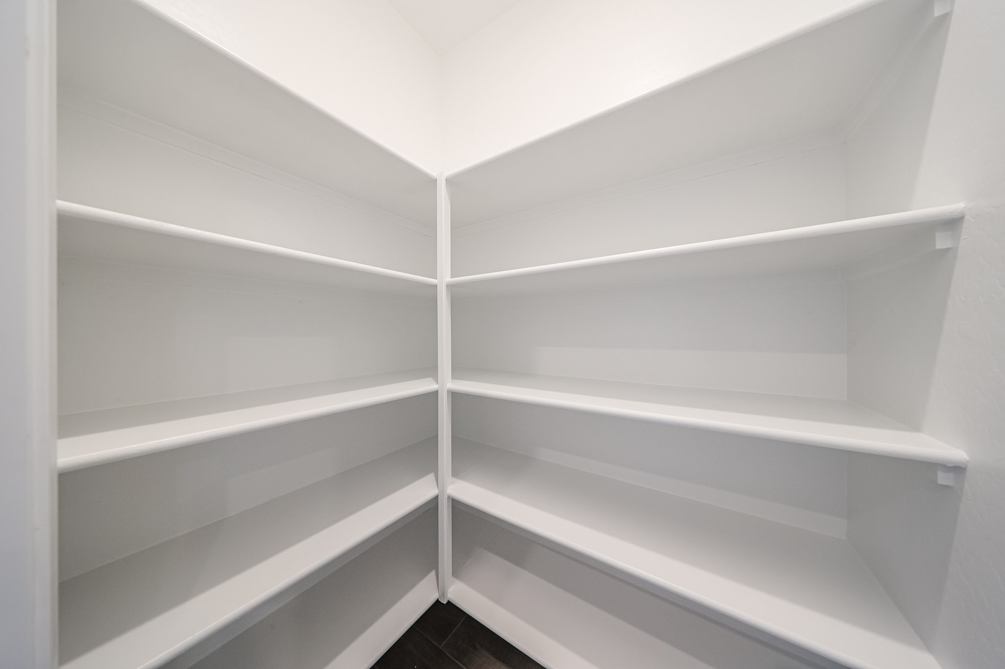 A white shelf with white shelves.