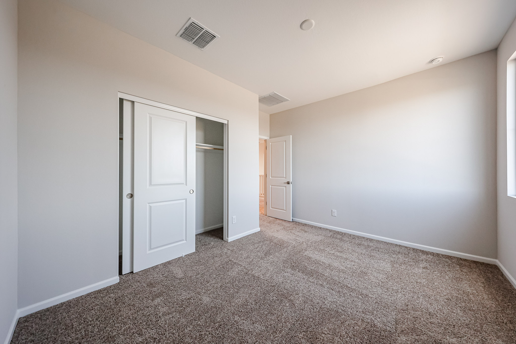 A room with white doors.