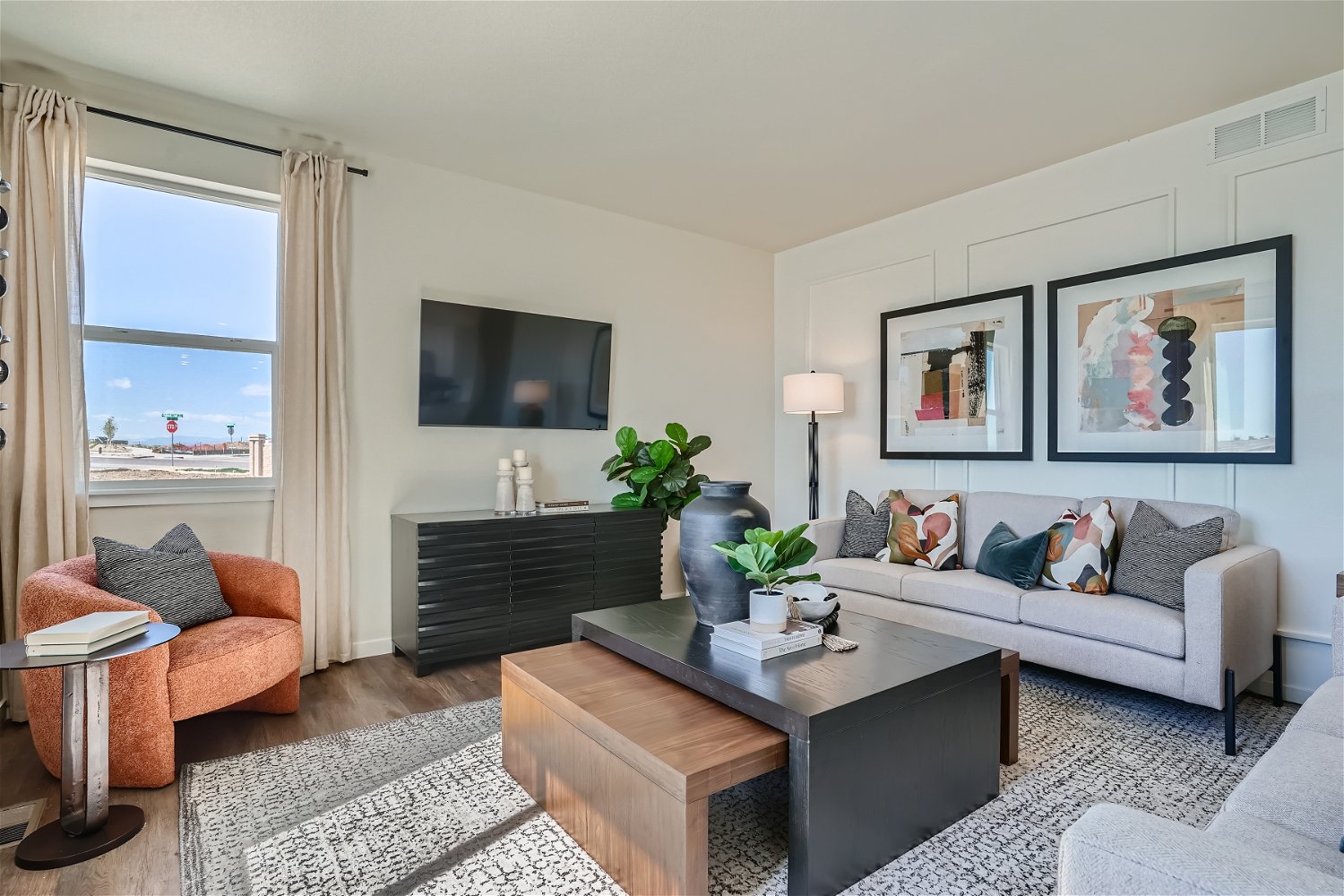 A living room with a couch and a coffee table.
