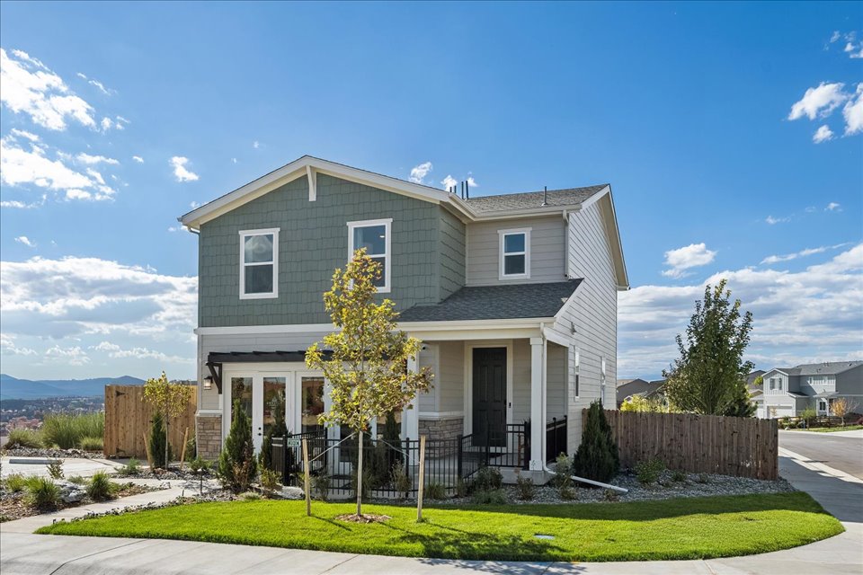 A house with a fence around it.