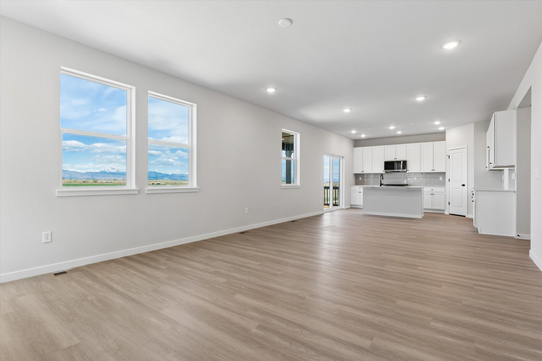A large empty room with white walls.