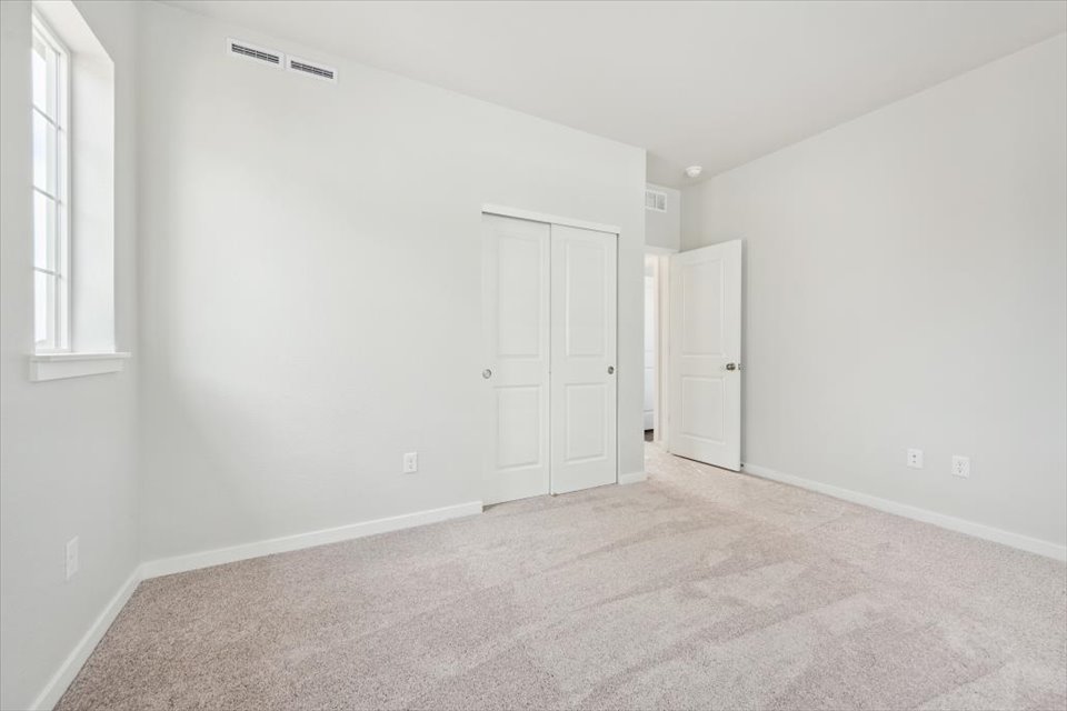 A room with white doors.