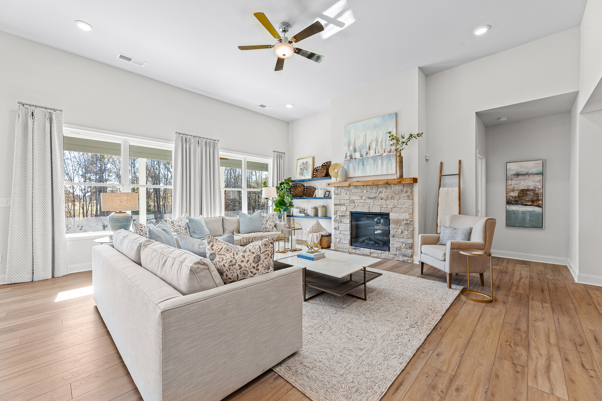 A living room with a fireplace.