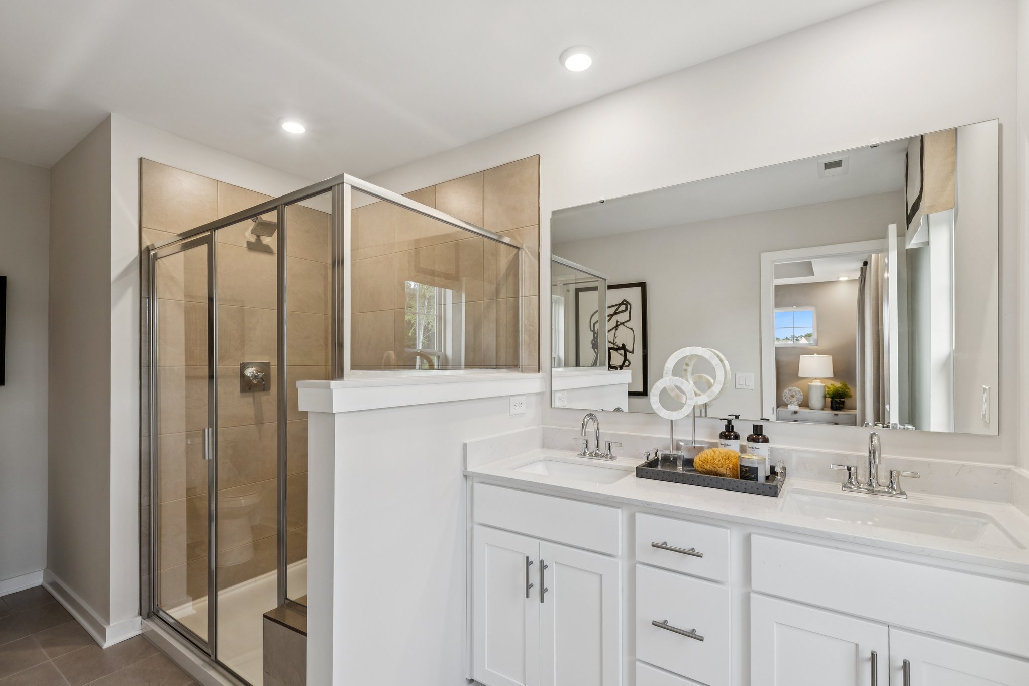 A bathroom with a glass shower.