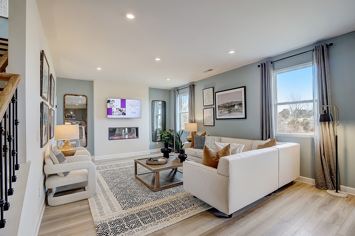 A living room with a large window.