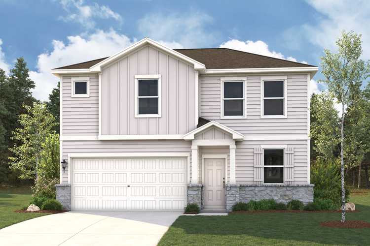 A white house with a garage.