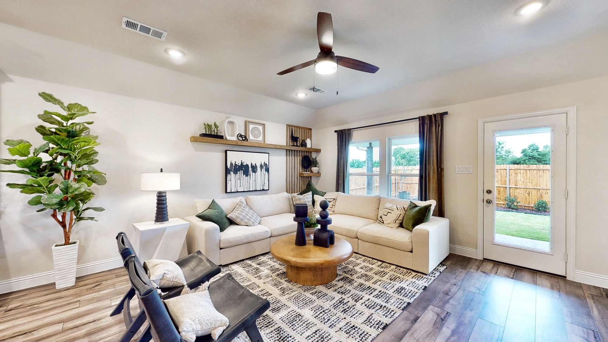 A living room with a large window.