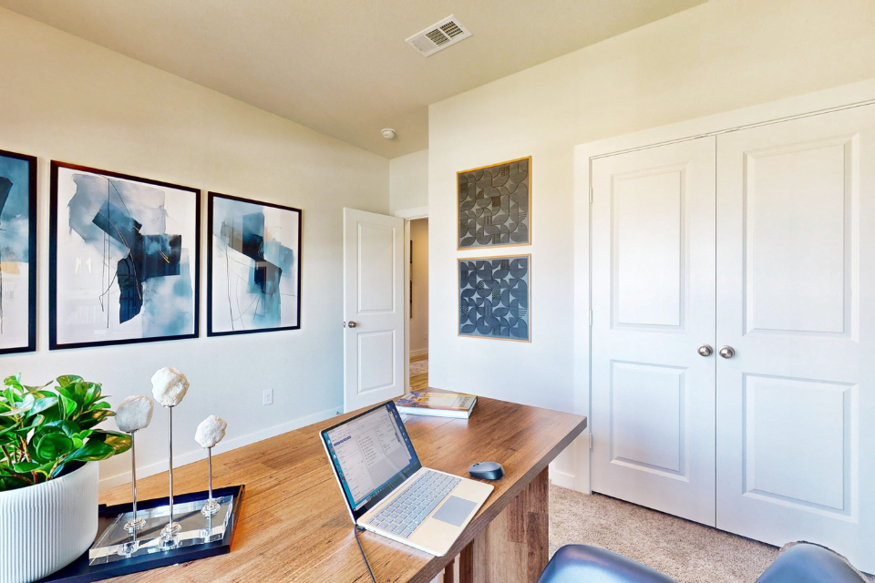 A laptop on a table.