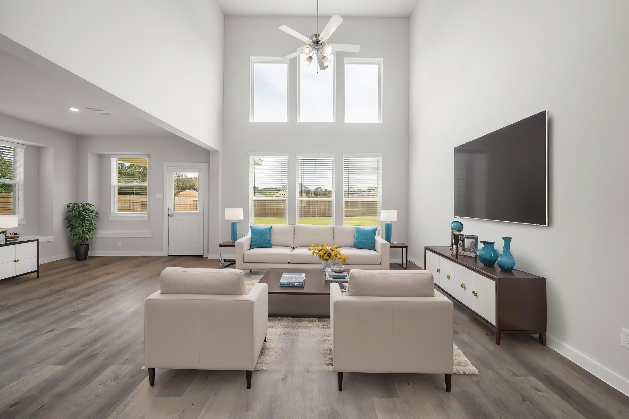 A living room with a large window.