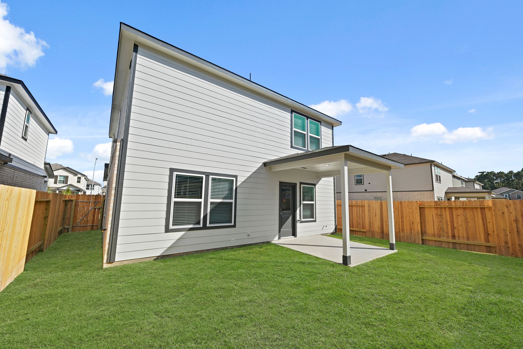 A house with a fence around it.