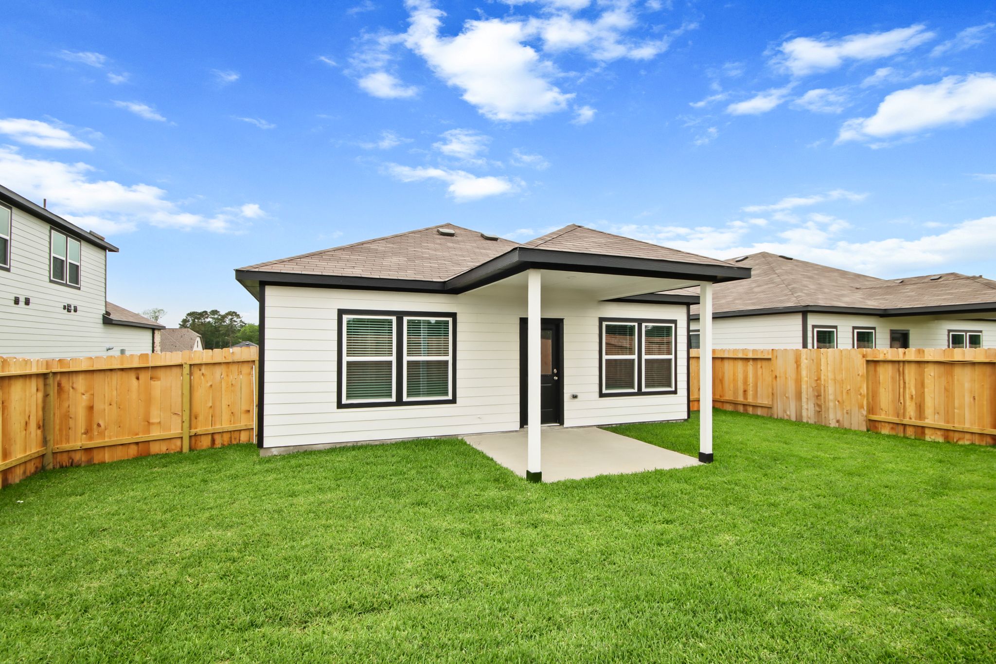 A house with a fence around it.