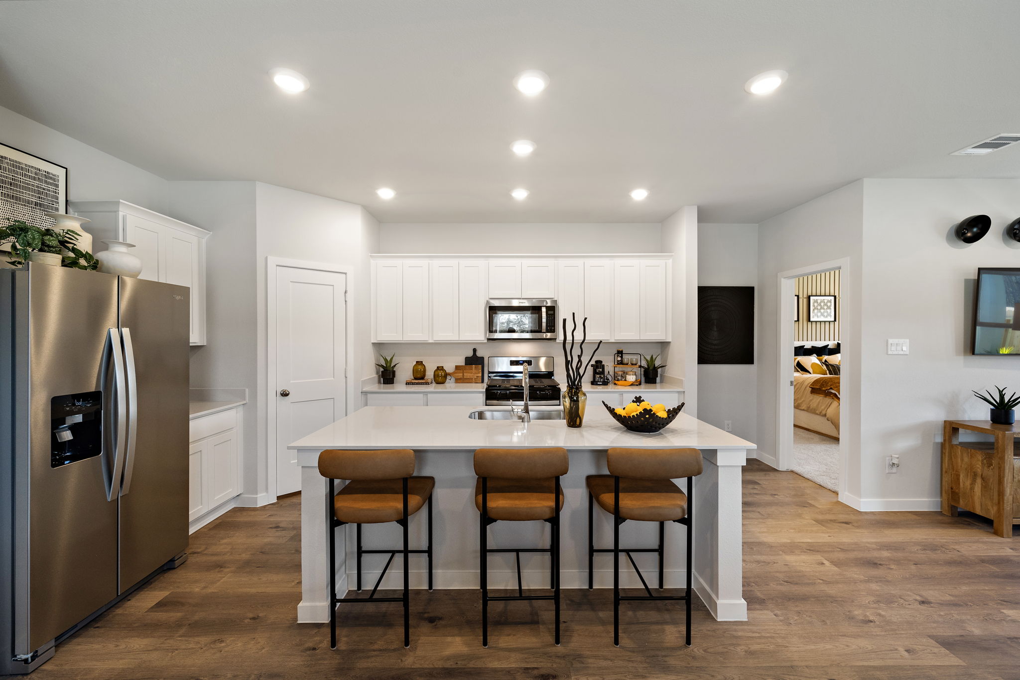 A kitchen with a dining table.