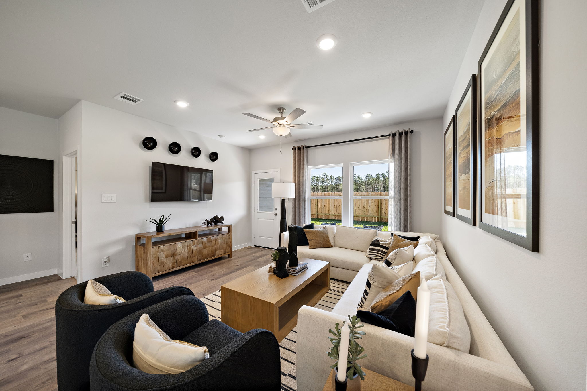 A living room with a large window.