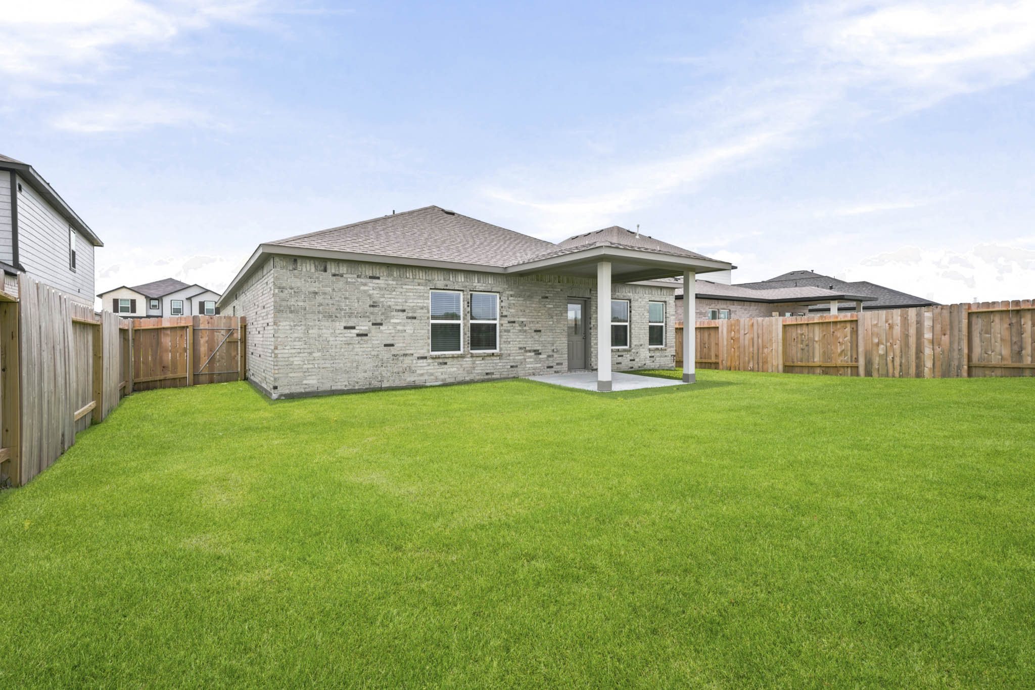 A house with a fence around it.