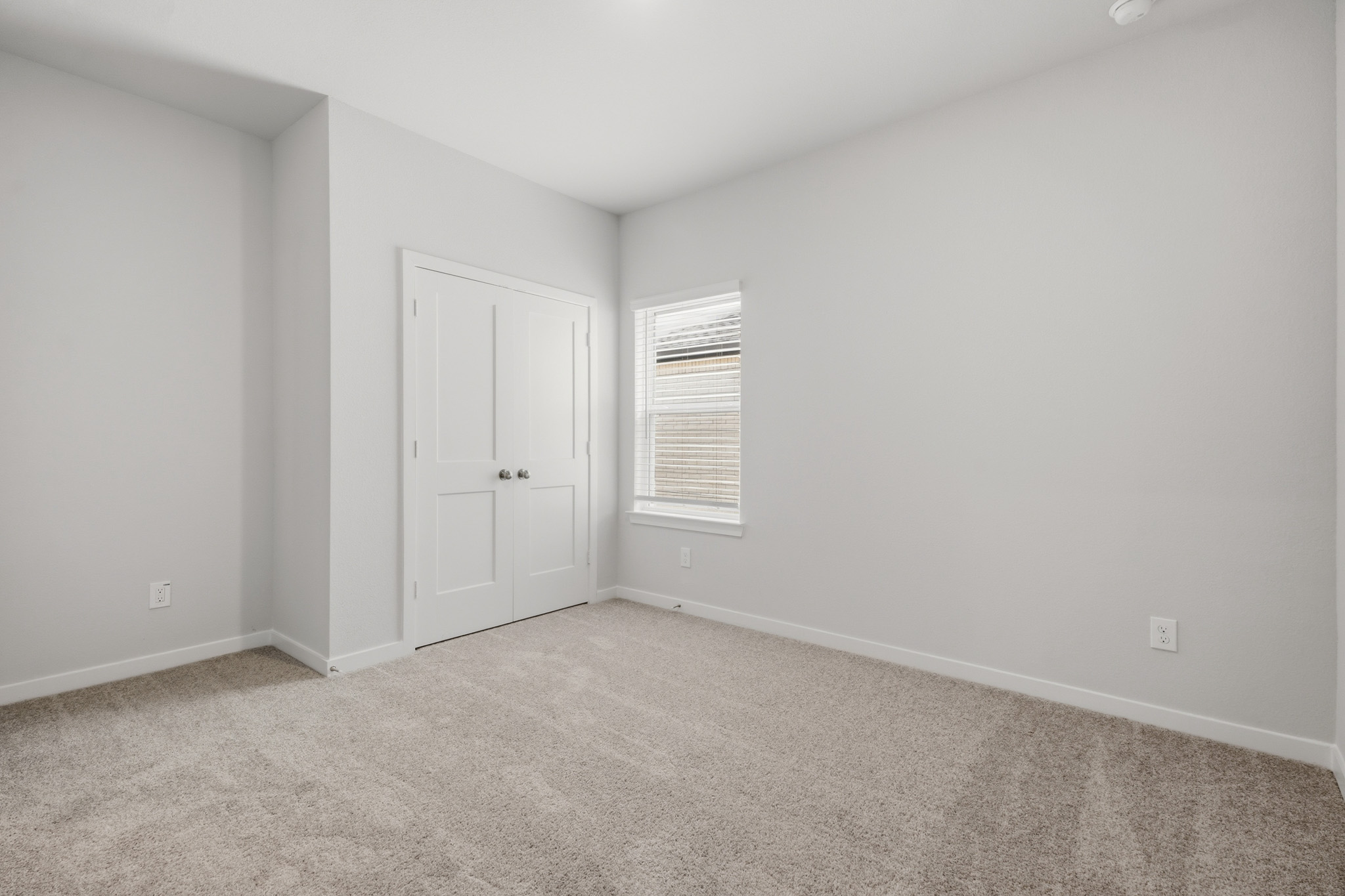 A room with white doors.