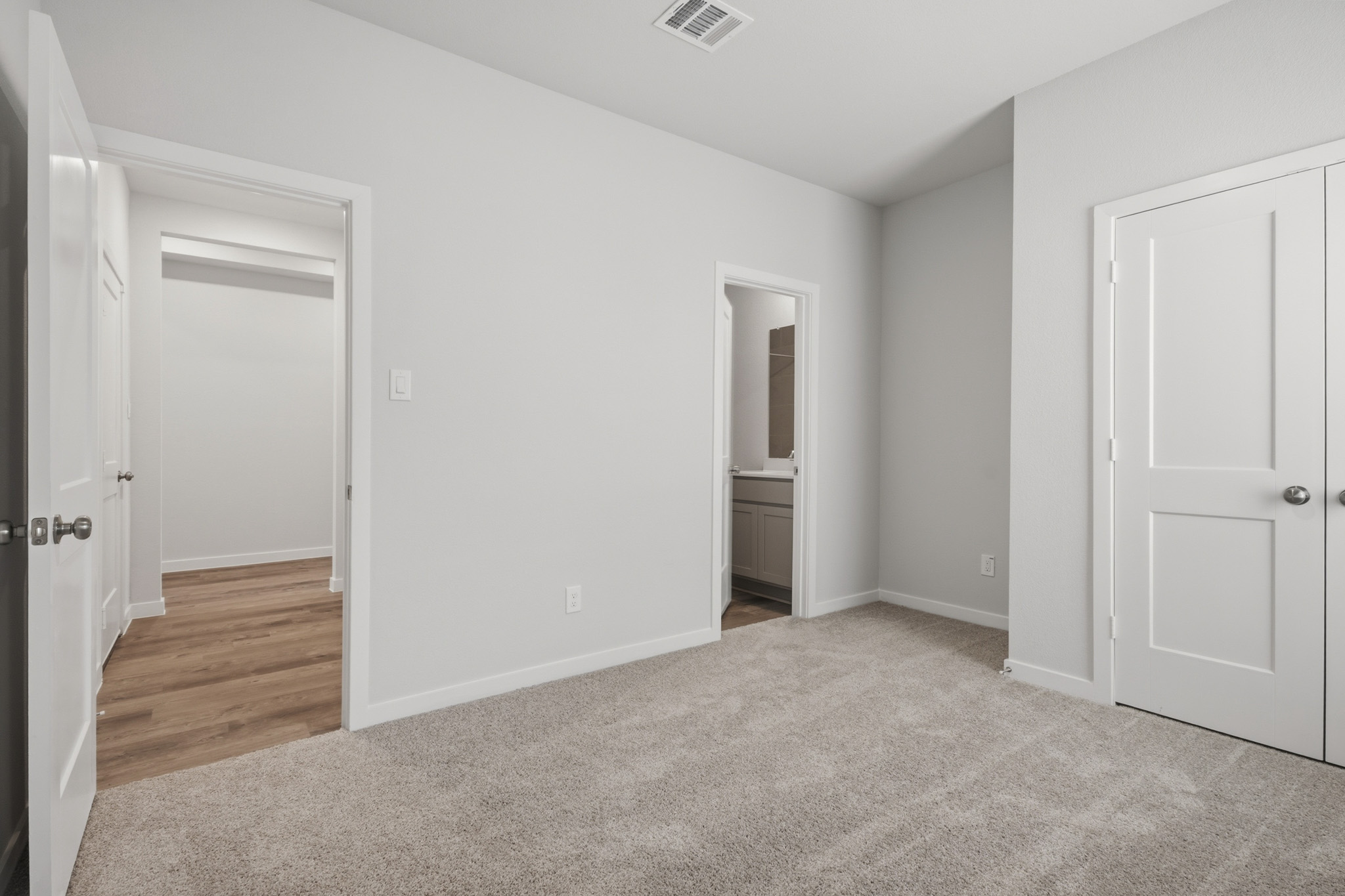 A room with white doors.