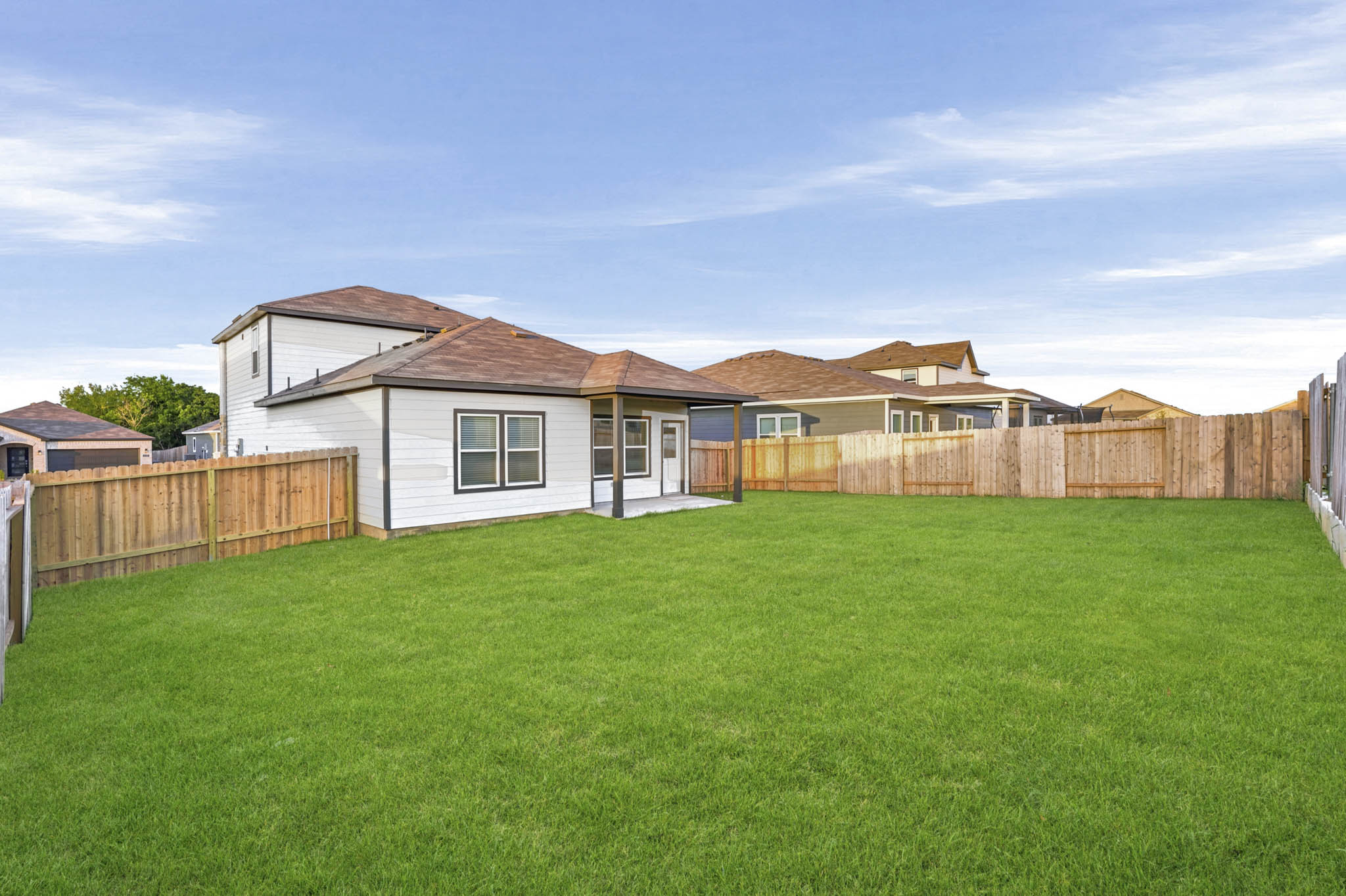 A house with a fence around it.