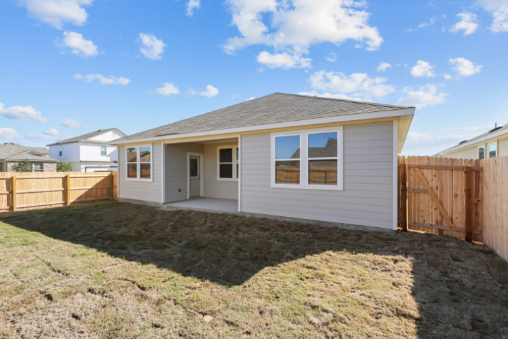 A house with a fence around it.