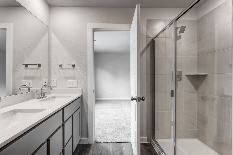 A bathroom with a glass shower.