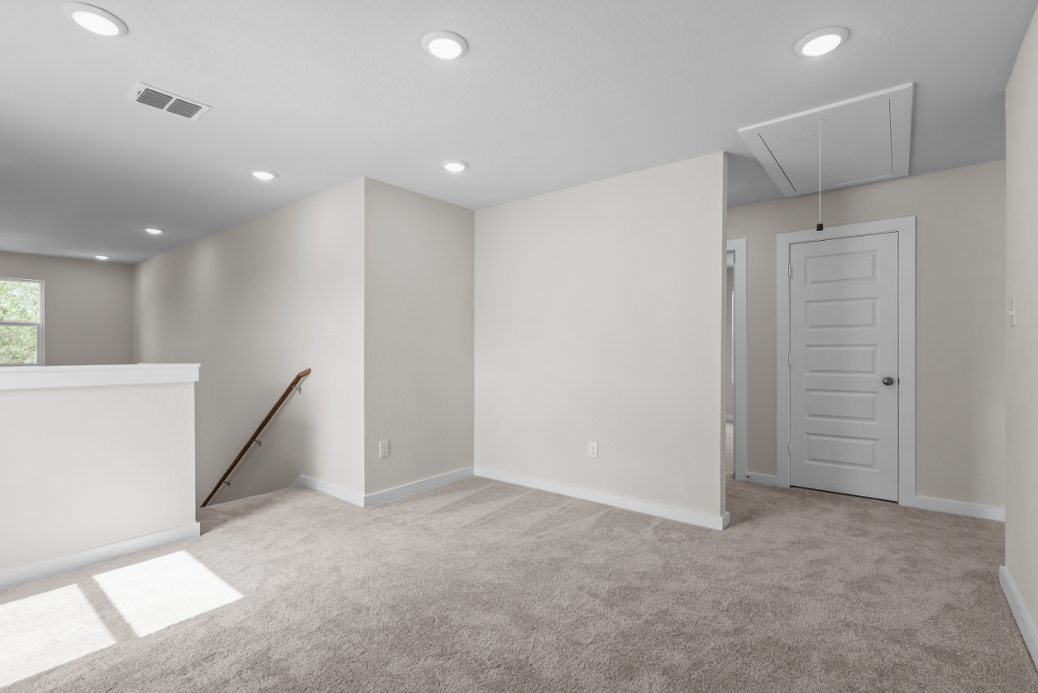 A room with white walls and a white floor.