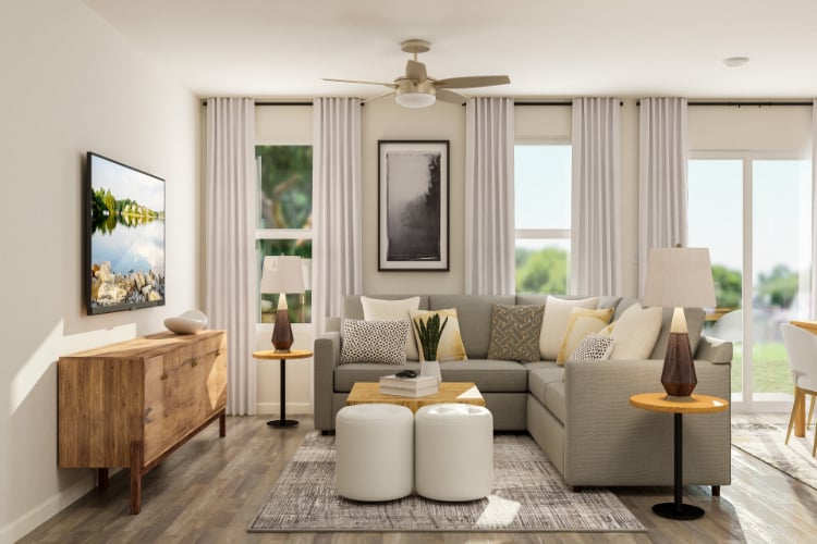 A living room with a couch and a table.